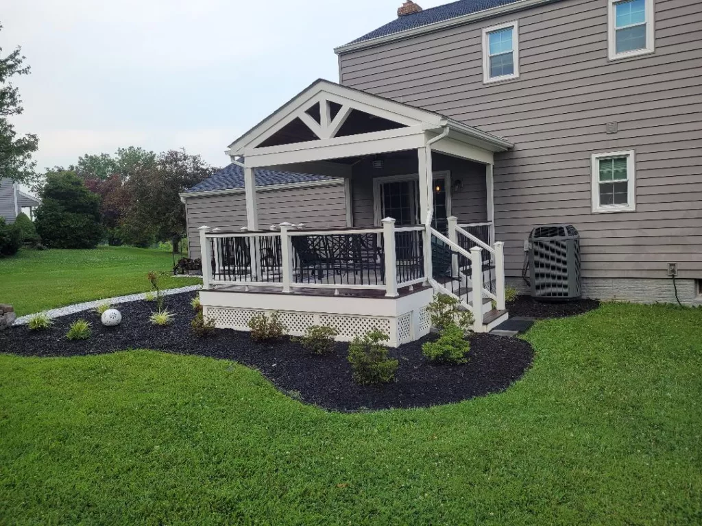 archway deck covered gray house lattice roof awning